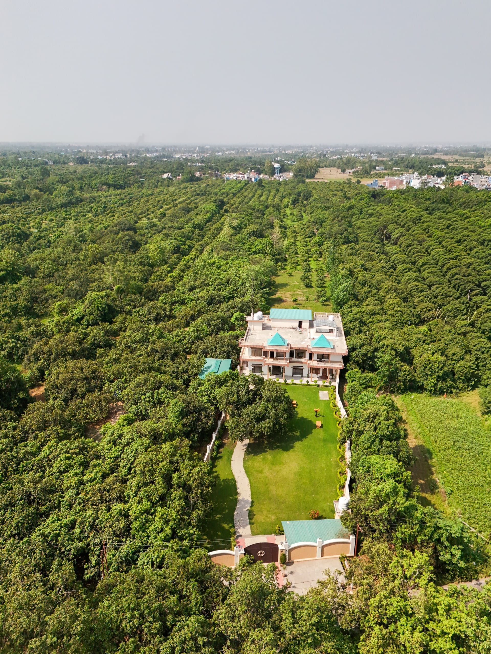 Atithi Stays — the estate amid its orchards